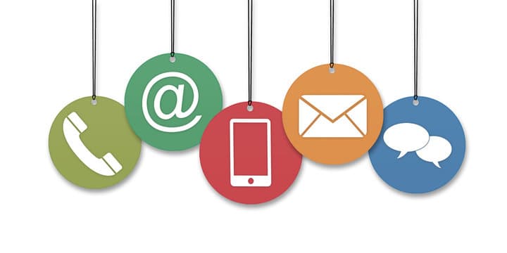 Colorful hanging circular tags featuring icons for phone, email, mobile, and chat communication methods.